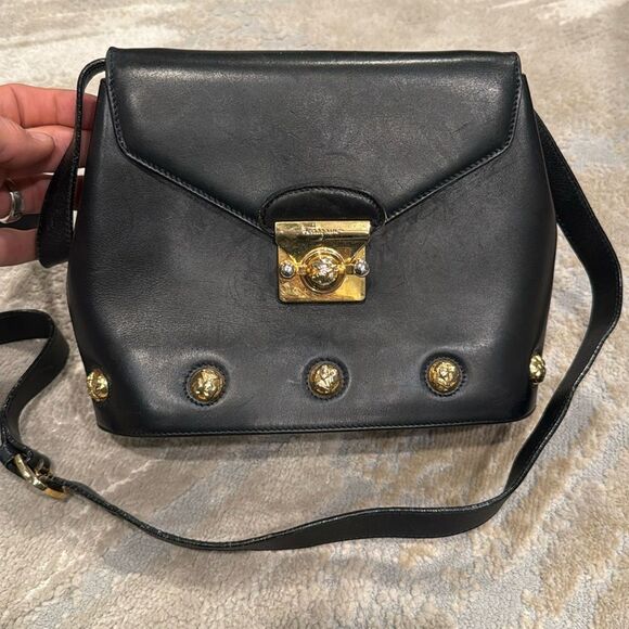 Salvatore Ferragamo Handbags - Salvatore Ferragamo Ladies Handbag black leather with gold hardware GUC read